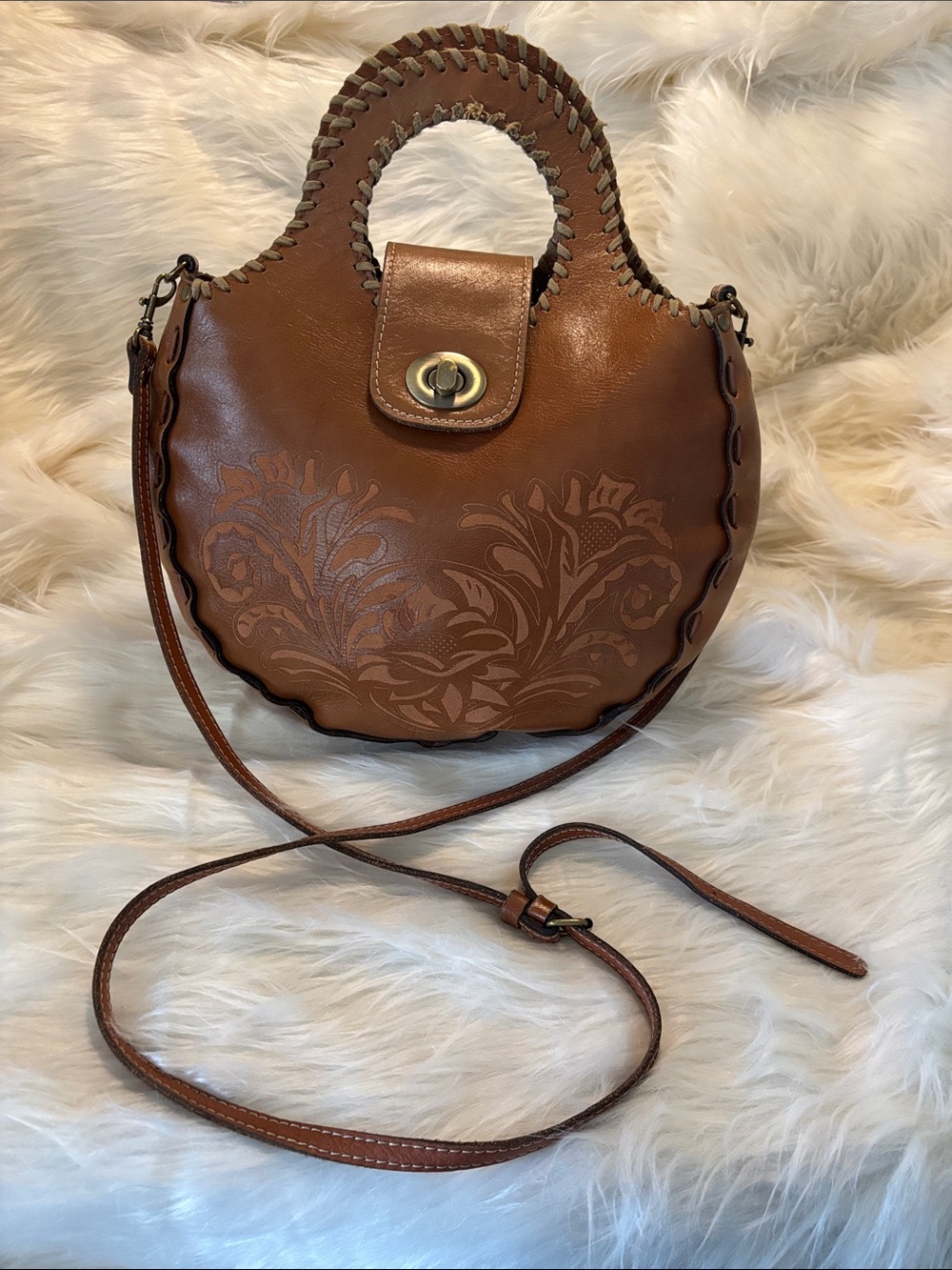 Patricia Nash Cognac Floral-Embossed Sadle Shaped Crossbody Bag